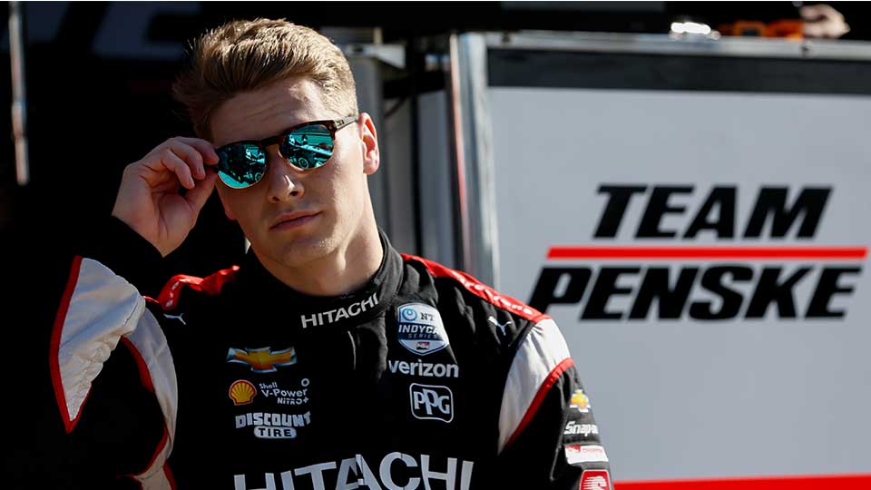 Josef Newgarden poses in the pits