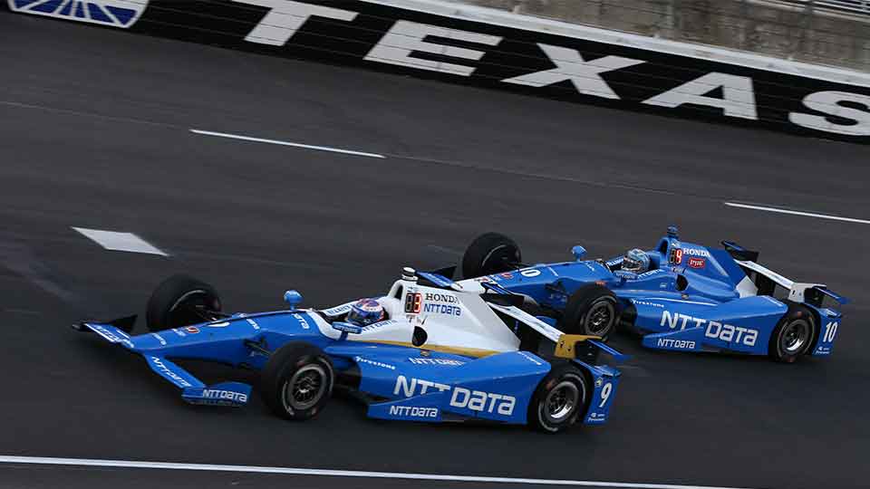 Scott Dixon and Tony Kanaan on track at Texas Motor Speedway